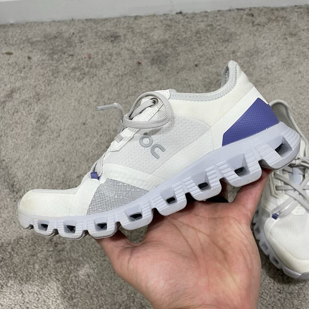 On Running Cloud Athletic Shoes in White with Light Purple Accents - Picture 2 of 9